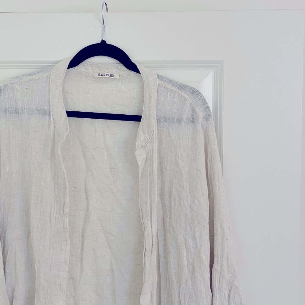 NWOT. Black Crane. Square shirts. One size. Cream.